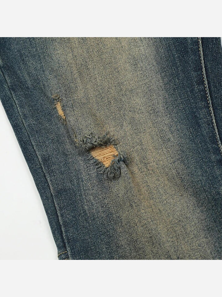 Jeans With Ripped Design